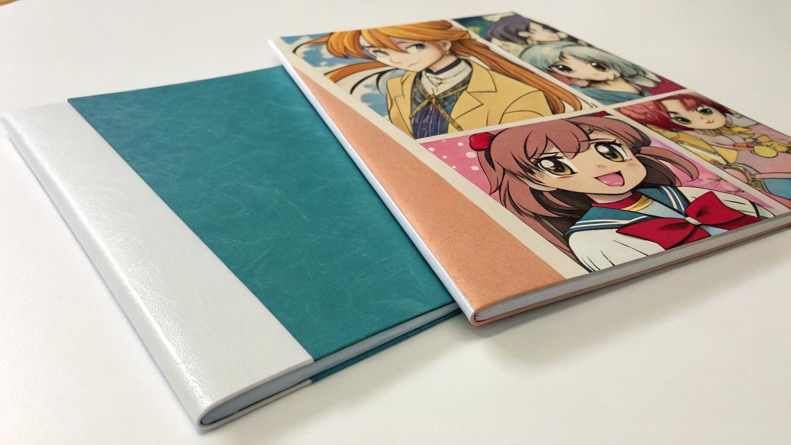 A comparison of coated vs uncoated paper side-by-side with manga illustrations