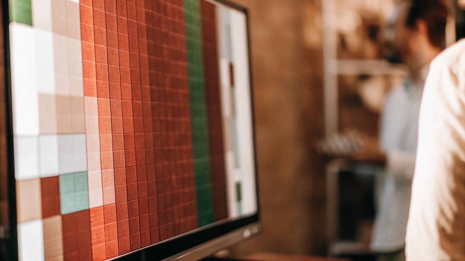 An extreme close-up of a monitor screen showing the individual red, green, and blue pixels that make up an image.